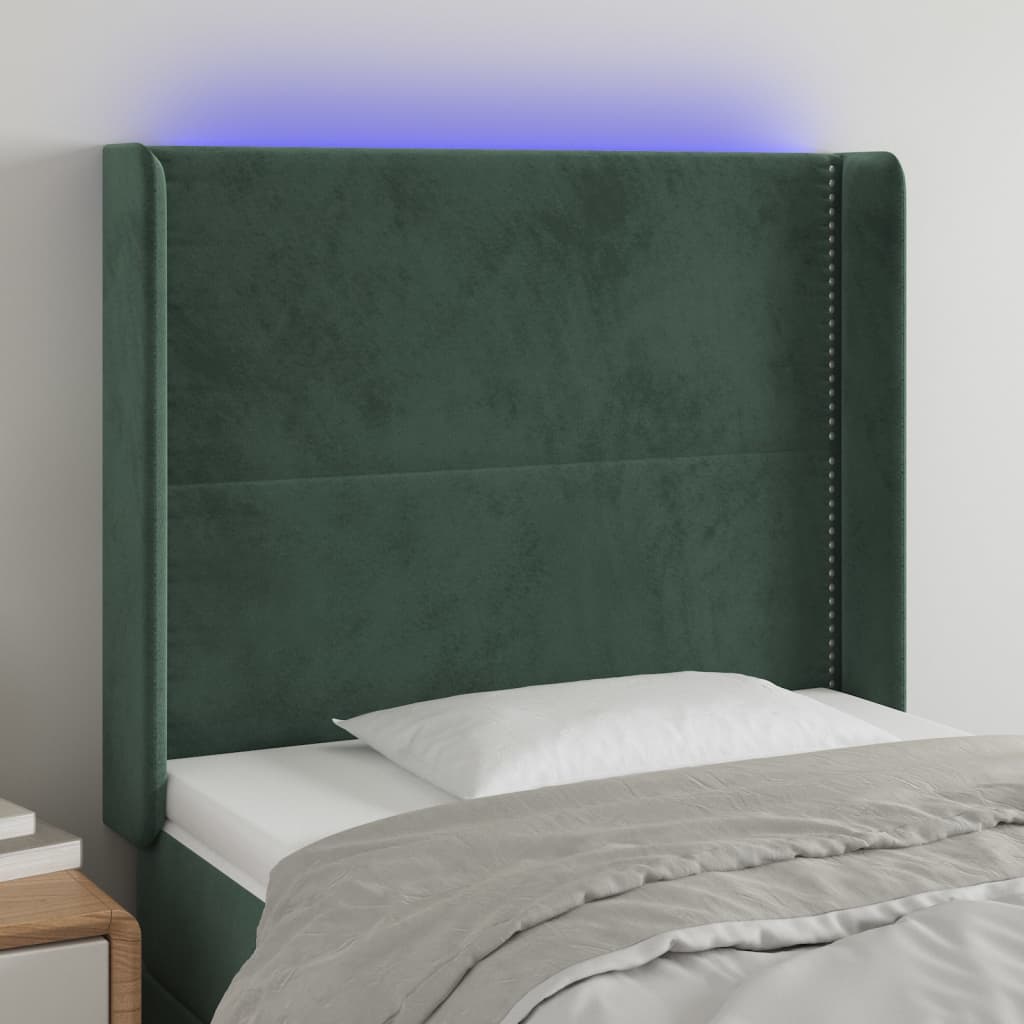 Čelo postele s LED tmavě zelené 83 x 16 x 118/128 cm samet