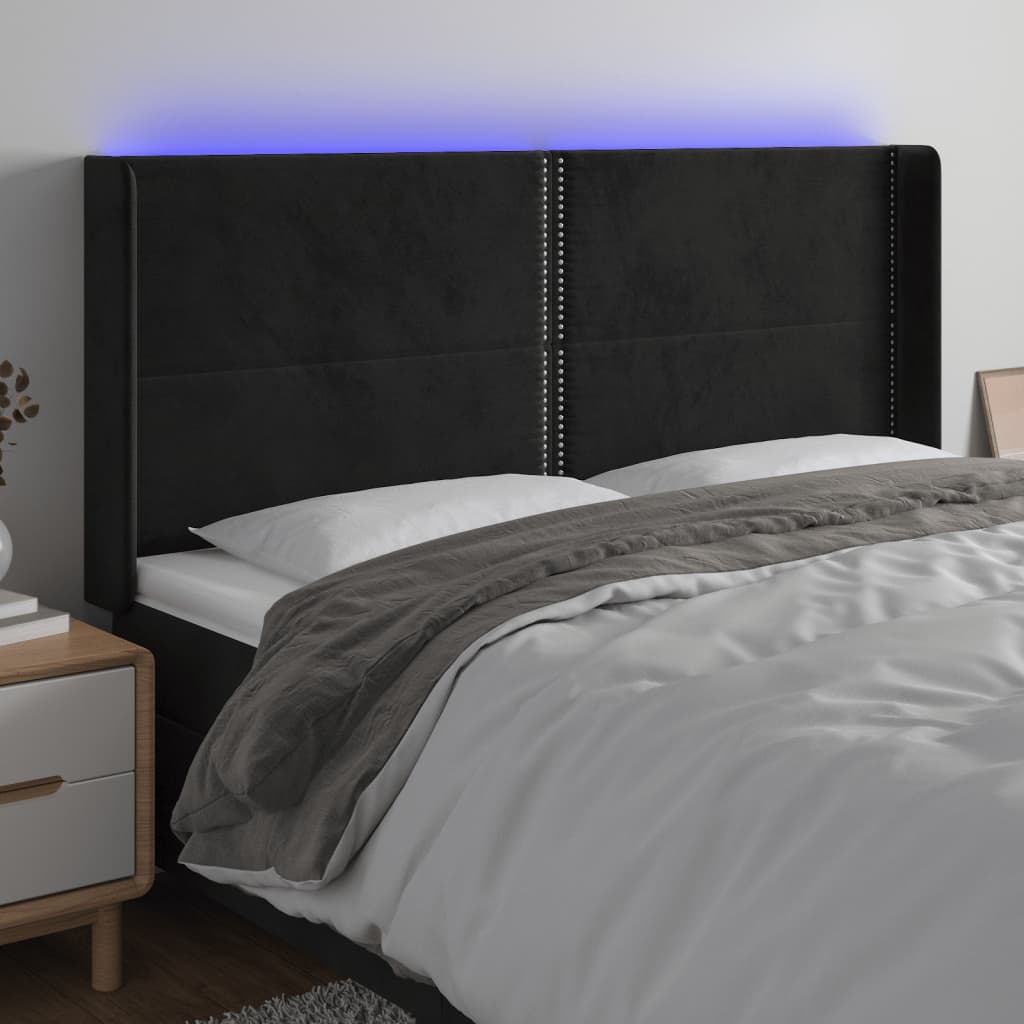 Čelo postele s LED černé 163 x 16 x 118/128 cm samet