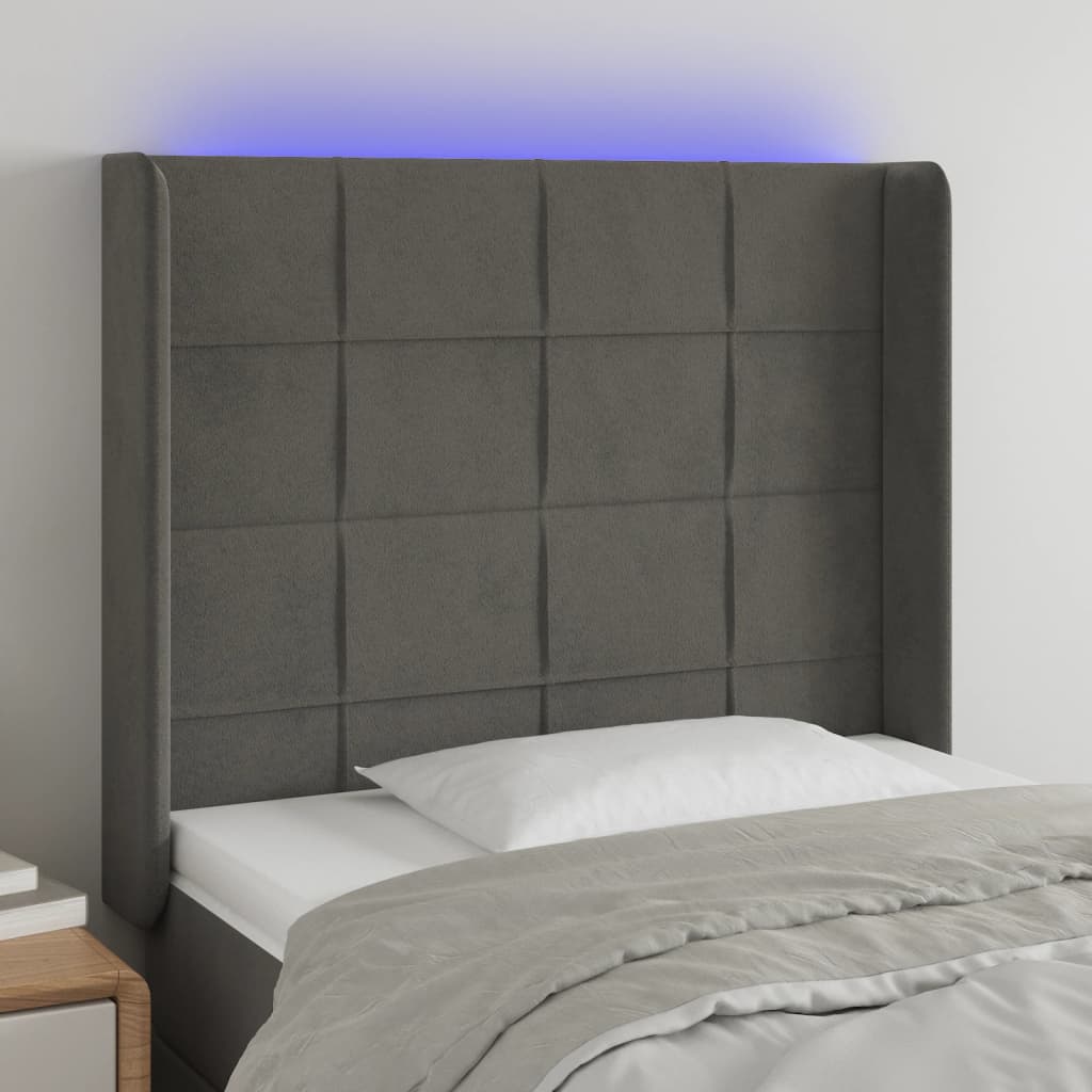 Čelo postele s LED tmavě šedé 103 x 16 x 118/128 cm samet