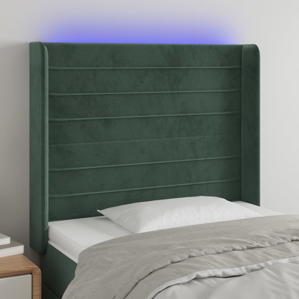 Čelo postele s LED tmavě zelené 83 x 16 x 118/128 cm samet
