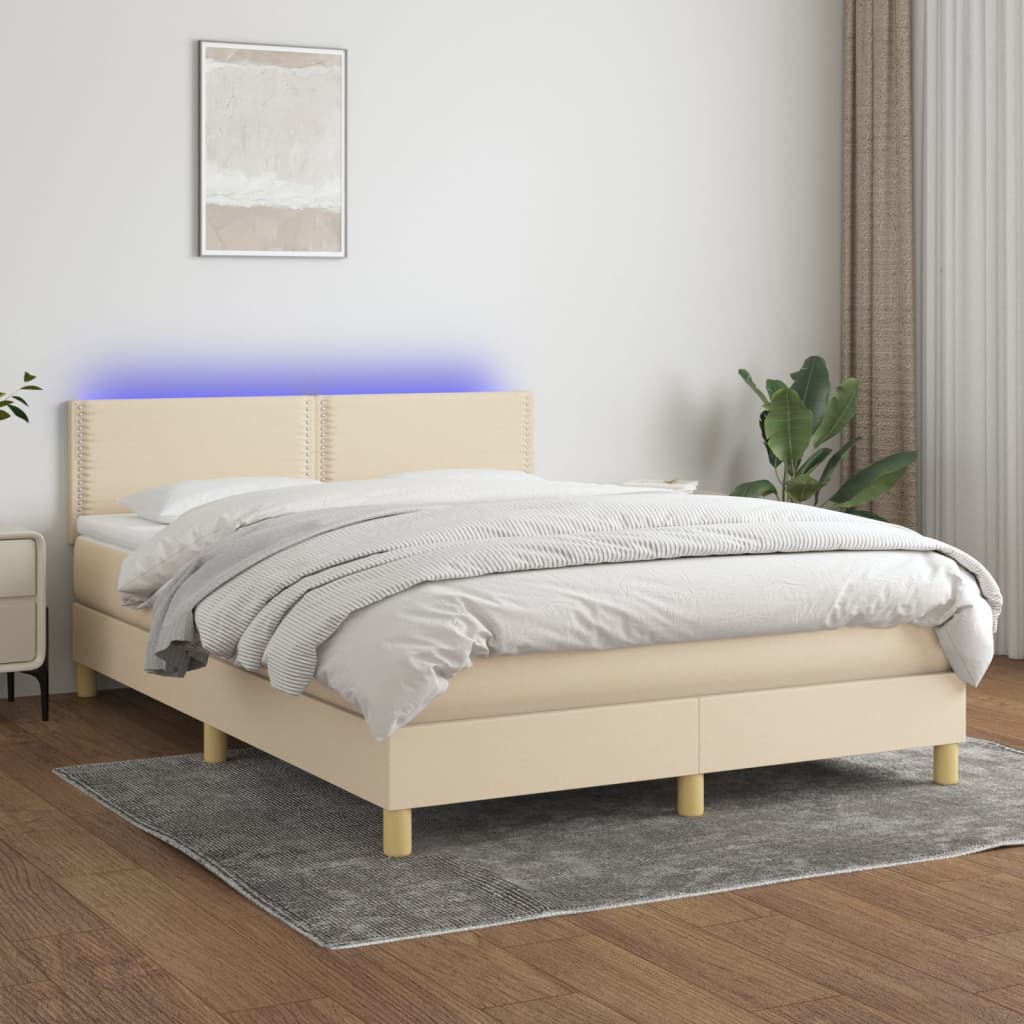 Box spring postel s matrací a LED krémová 140x200 cm textil