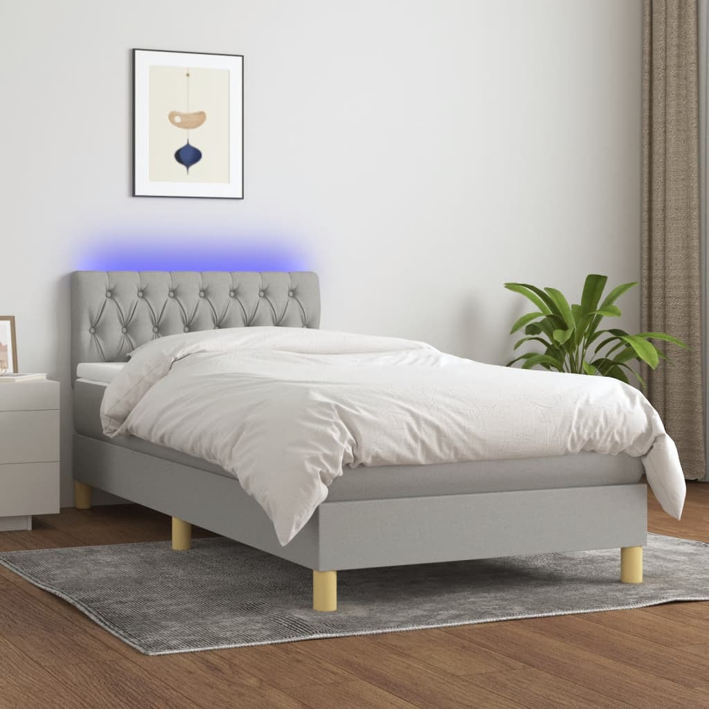 Box spring postel s matrací a LED světle šedá 90x200 cm textil