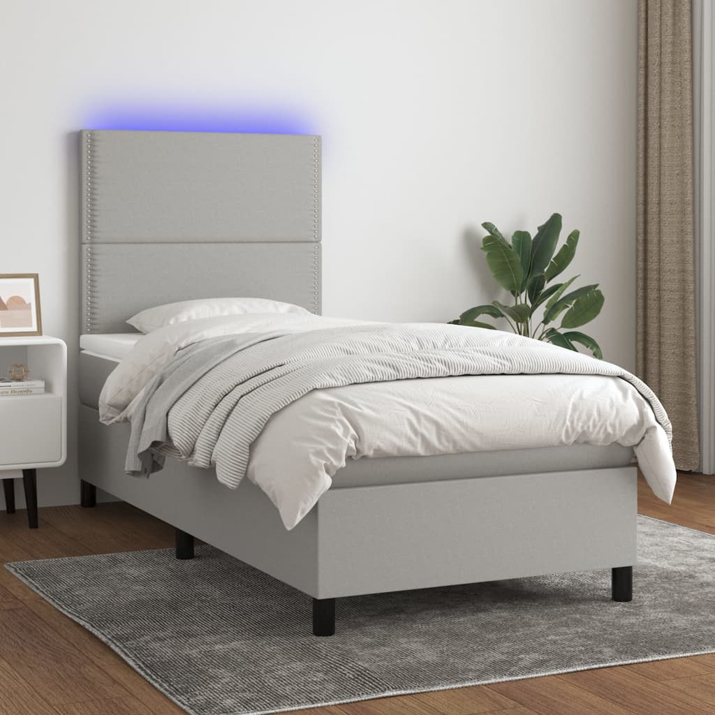 Box spring postel s matrací a LED světle šedá 90x190 cm textil