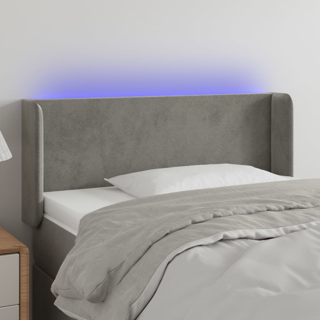 Čelo postele s LED světle šedé 93 x 16 x 78/88 cm samet