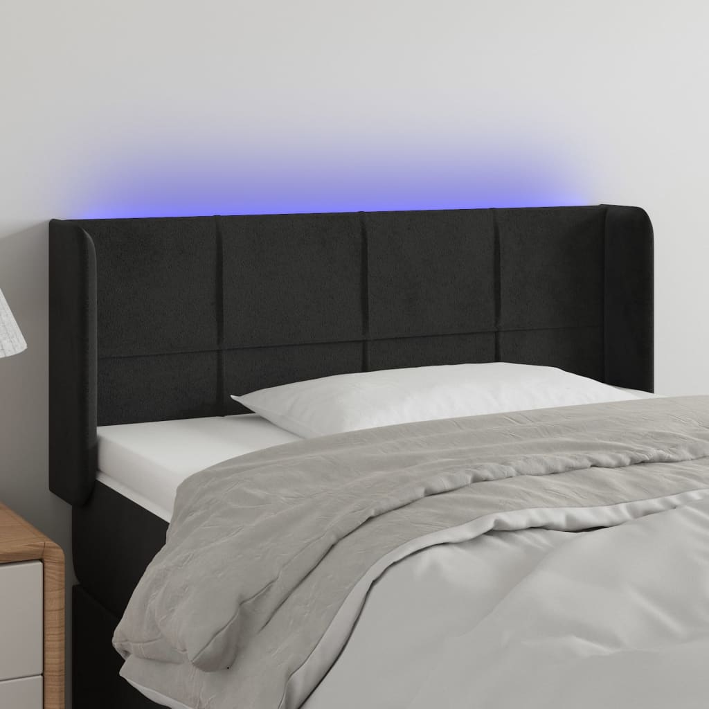 Čelo postele s LED černé 103 x 16 x 78/88 cm samet