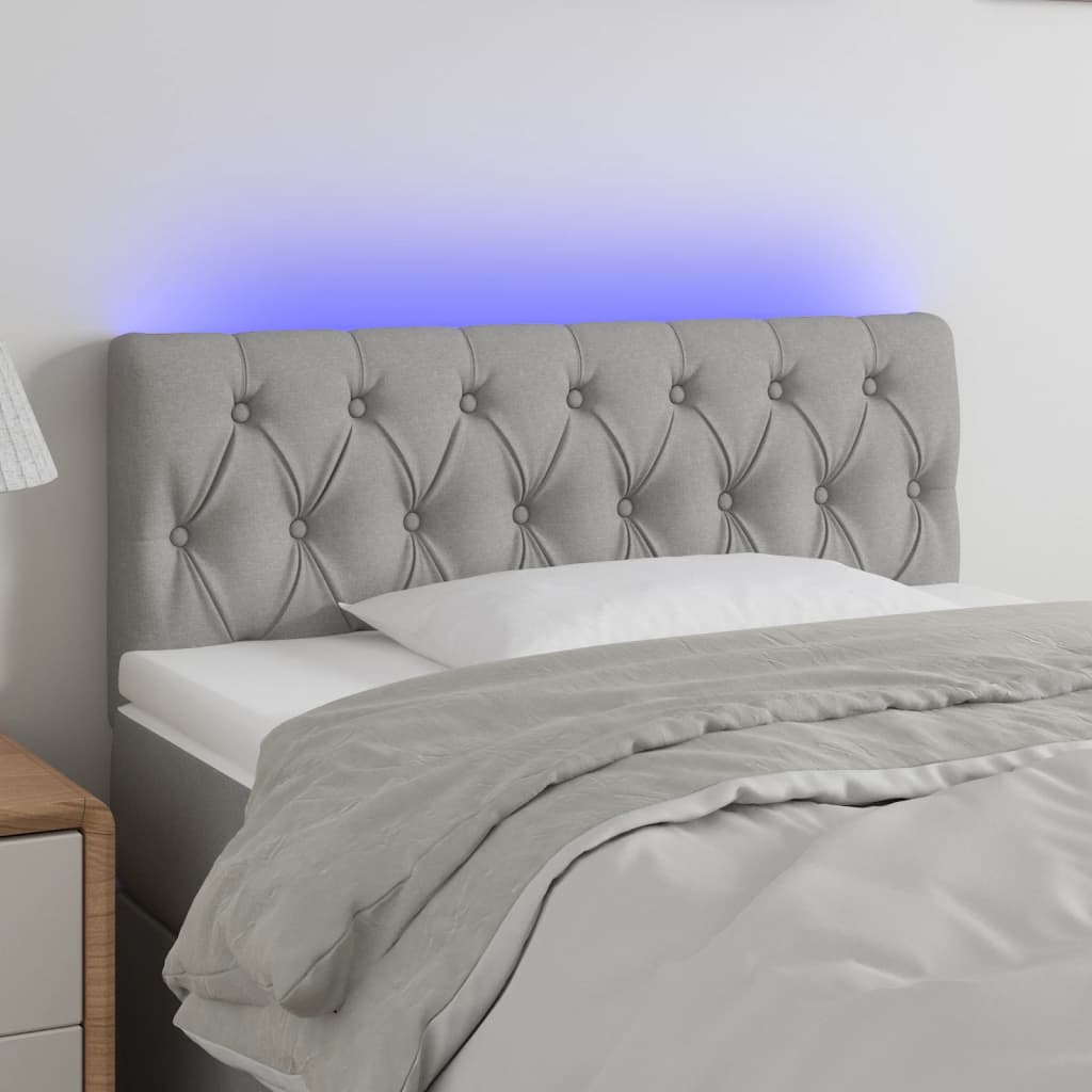 Čelo postele s LED světle šedé 100 x 7 x 78/88 cm textil