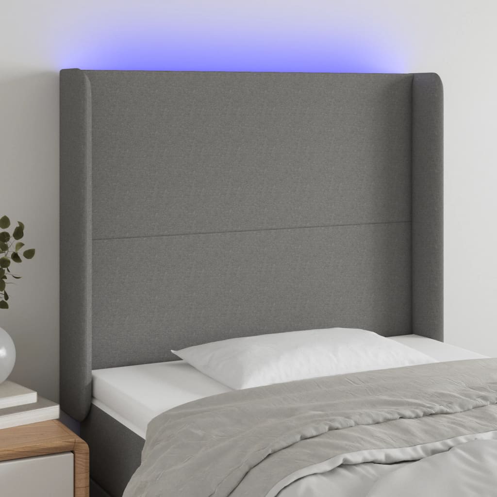 Čelo postele s LED tmavě šedé 93 x 16 x 118/128 cm textil