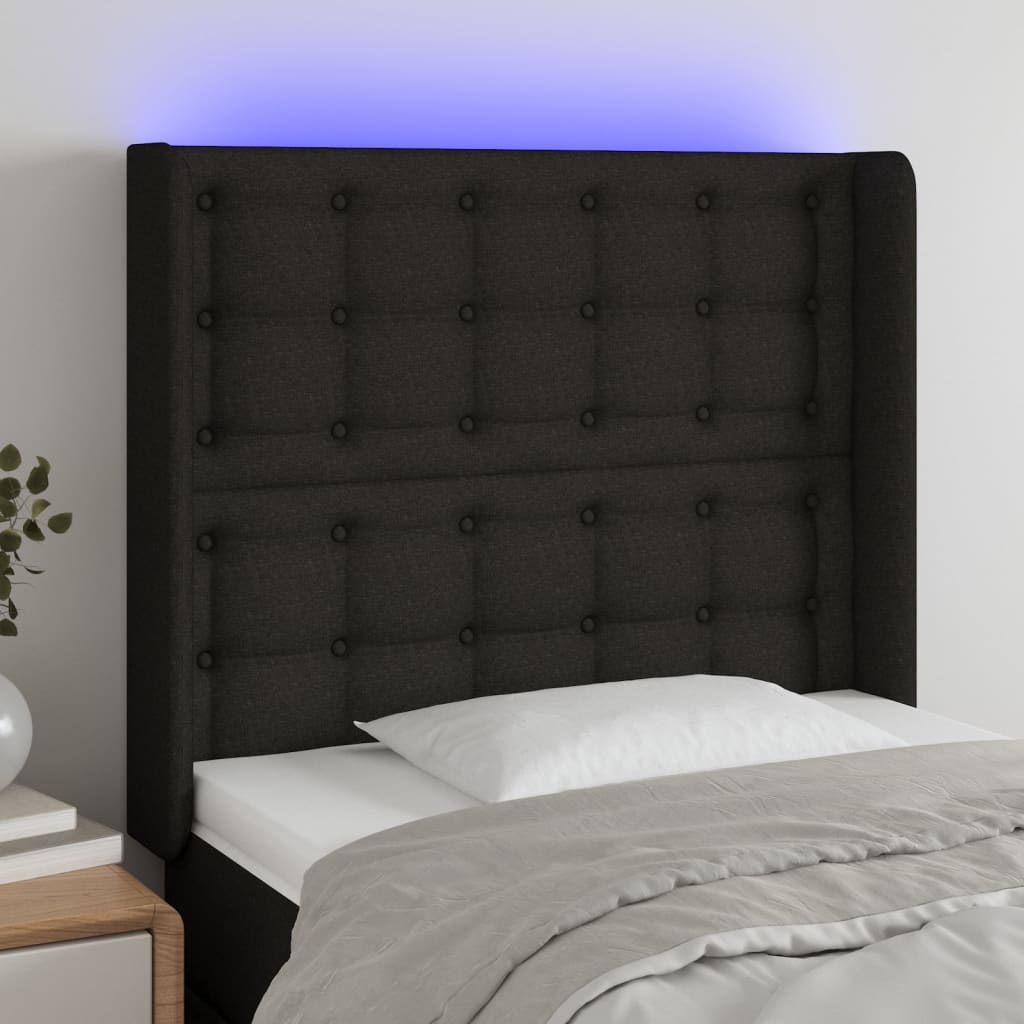 Čelo postele s LED černé 83 x 16 x 118/128 cm textil