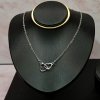 Infinity Hearts nyaklánc  női nyaklánc | ezüst színű, összefonódó szív medállal