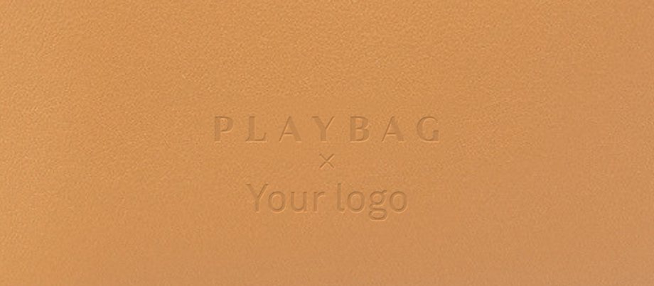 Close-up of “Your logo” debossed on a Sonk wallet