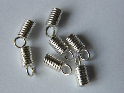 Koncovka na kůži, cca 10,5x3mm, postříbřeno