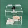 Plexi kasička, pokladnička s gravírem o rozměru 150x150x150mm + gravír a zámkem je vhodná pro Veřejné sbírky, charity, obce...