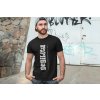 t shirt mockup of a man posing in front of a graffiti wall 28200