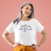 t shirt mockup featuring a senior woman posing at a studio 40321 r el2