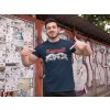 t shirt mockup of a fitness man posing against a wall with posters 28526(3)