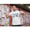 t shirt mockup of a fitness man posing against a wall with posters 28526