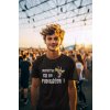 ai generated mockup of a happy man wearing a t shirt in a music festival m35827(1)