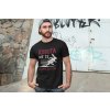 t shirt mockup of a man posing in front of a graffiti wall 28200(4)