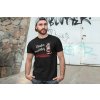t shirt mockup of a man posing in front of a graffiti wall 28200(1)