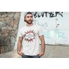 t shirt mockup of a man posing in front of a graffiti wall 28200