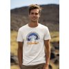 round neck tee mockup of a smiling man standing against some mountains for earth day m38194