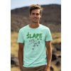 round neck tee mockup of a smiling man standing against some mountains for earth day m38194