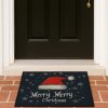 Černá rohožka SANTA STEP 60x90 cm s nápisem Merry Merry Christmas