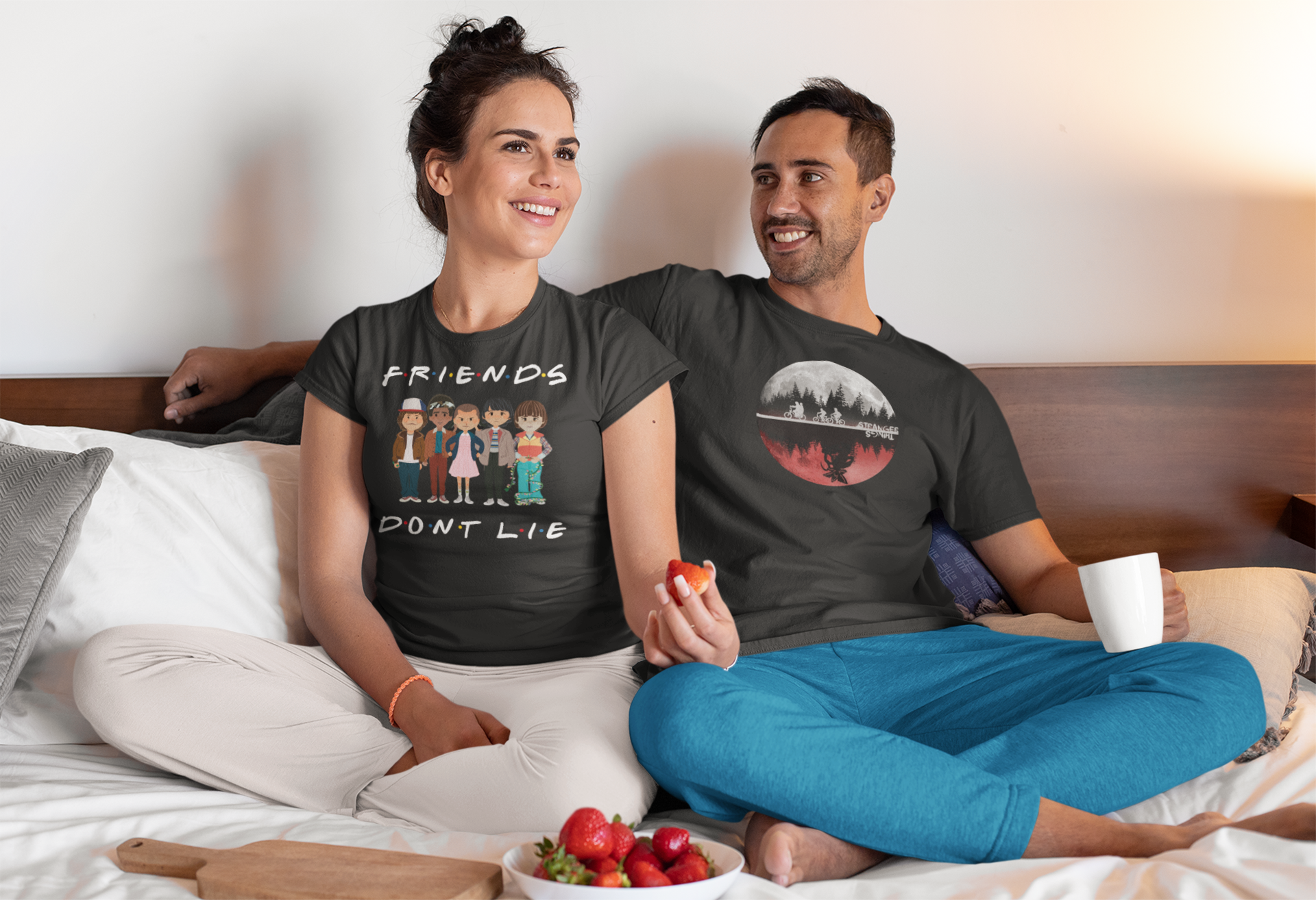 pajamas-t-shirt-mockup-of-a-happy-couple-watching-tv-in-their-bedroom-m768