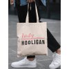cropped face mockup of a man holding a tote bag in the street 29424 (2) (1)