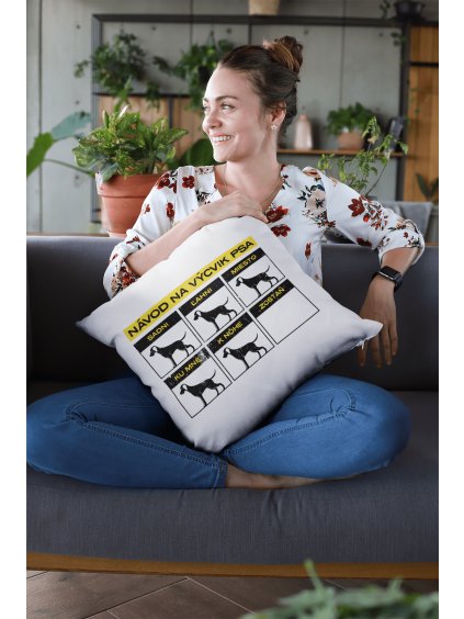 mockup of a smiling woman holding a pillow at a lounge 23611 (2) min