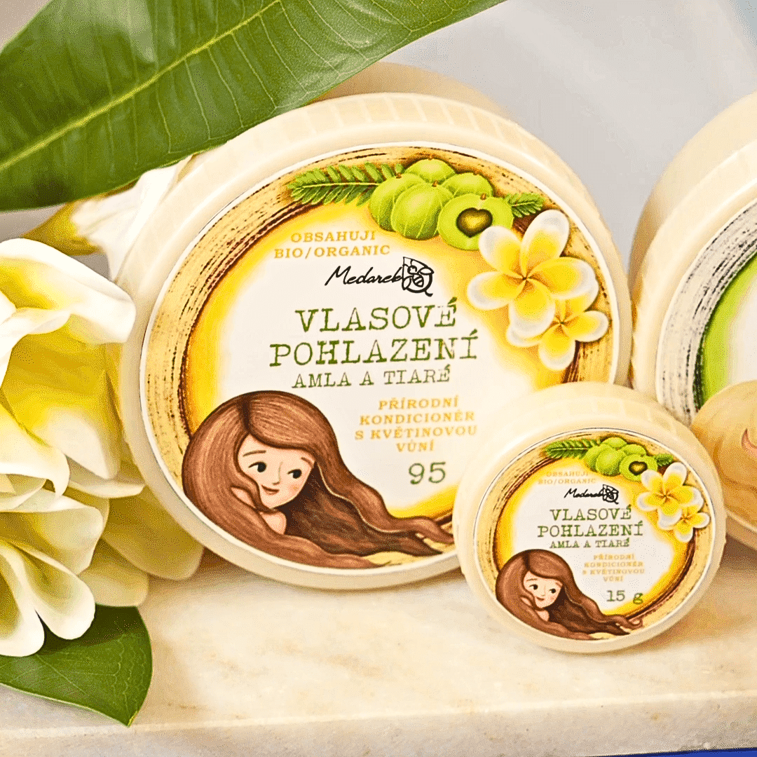 Medarek “Vlasové pohladenie – Amla & Tiaré” solid hair conditioner—large and mini tins with white tiaré flowers and green leaves.