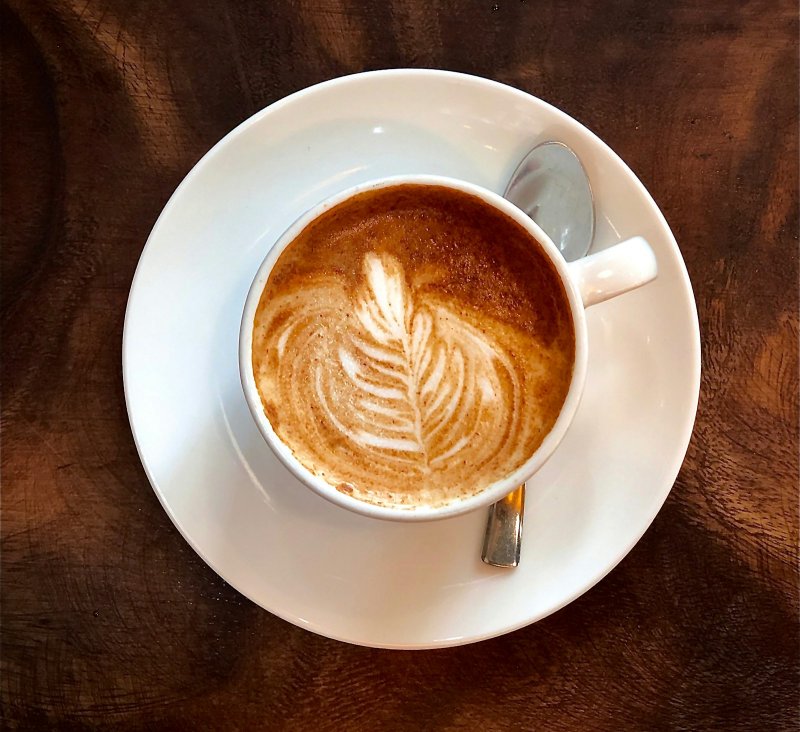 Šálek kávy s latte art