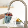 1076550 fruit and veggie pot ellipse rinsing with tap water kopie.a