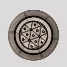 Detailní pohled zespodu na 13 přesně umístěných otvorů sprchy na dripper.