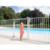 TIGER PUMA TWIST40 Girl pink dress at swimming pool gate