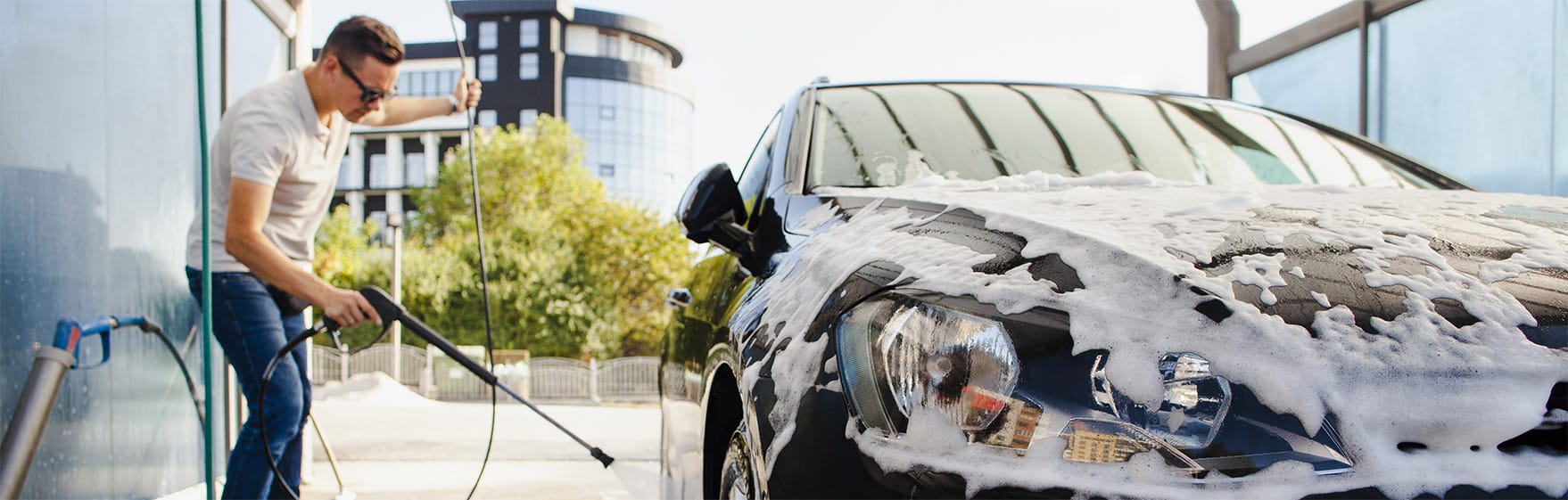 man-removing-foam-from-car