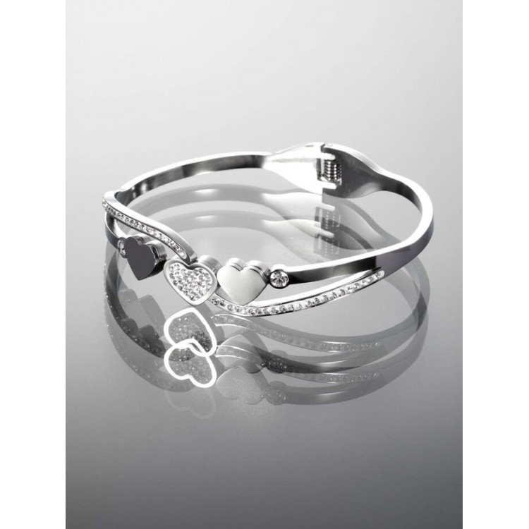 Prosperk Pevný náramek z chirurgické oceli se třemi srdíčky a třpytivými krystaly S4747