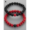 Krásné náramky z korálků barveného červeného magnezitu a lávového kamene