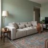 Create a photorealistic interior scene INPUTS 1x reference image of sofa on white background d 62ce7596 ece1 4ed2 aef8 bb9eaf295f34