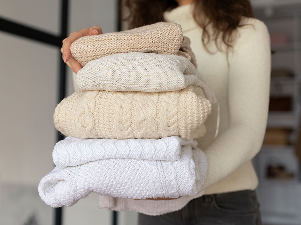 Wie pflegt man Pullover und warme Kleidung?