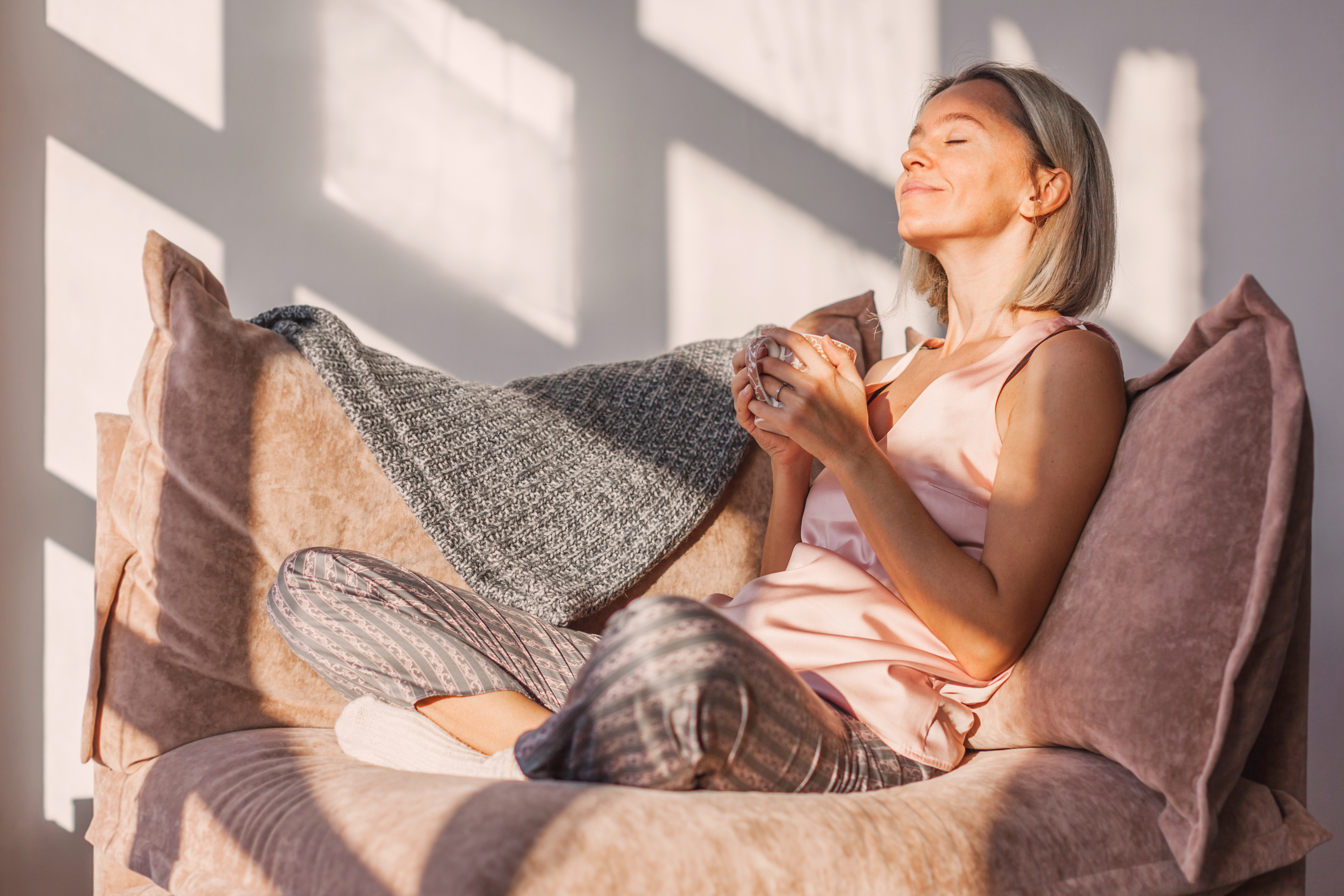 Woman with a cup of morning tea