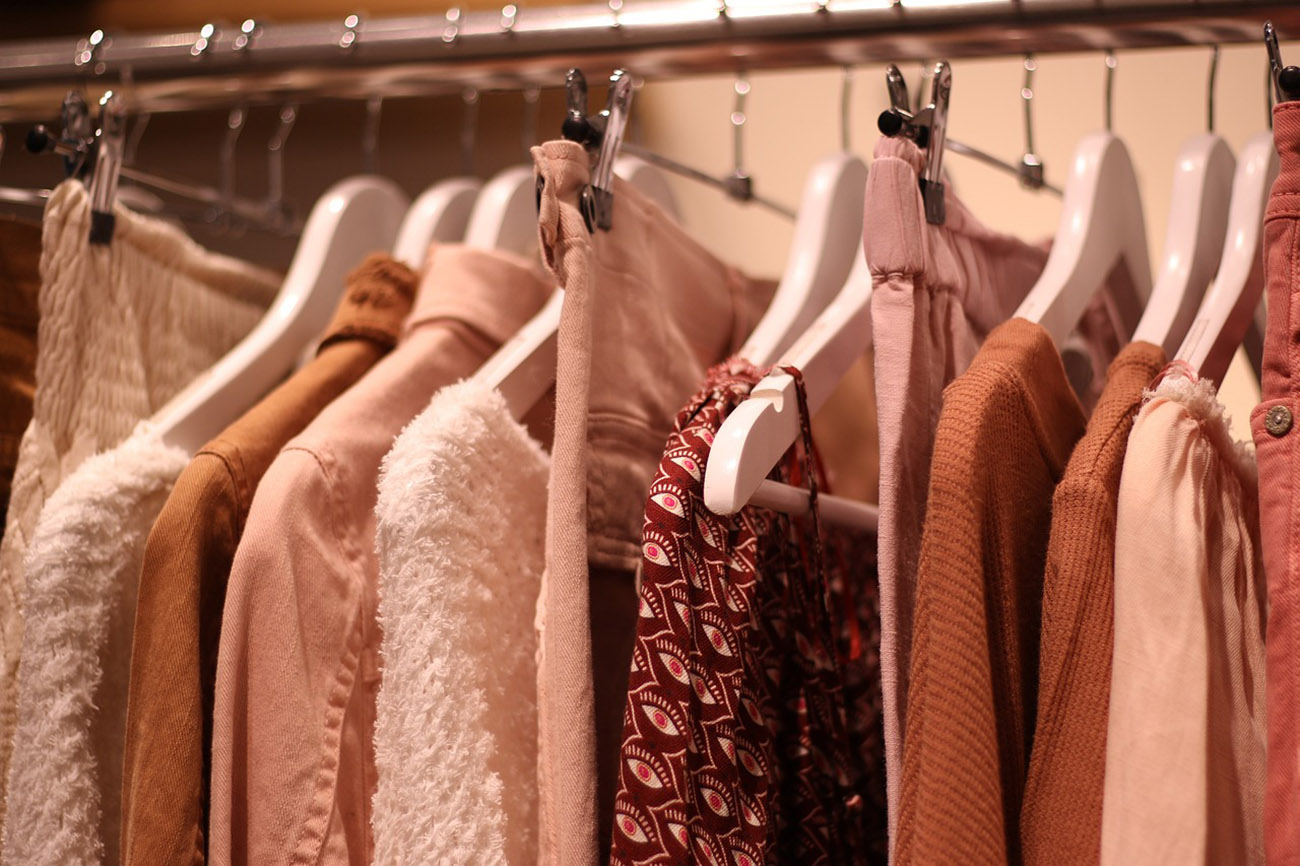 Clothes hung on hangers