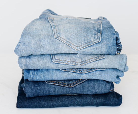 Folded jeans in a stack