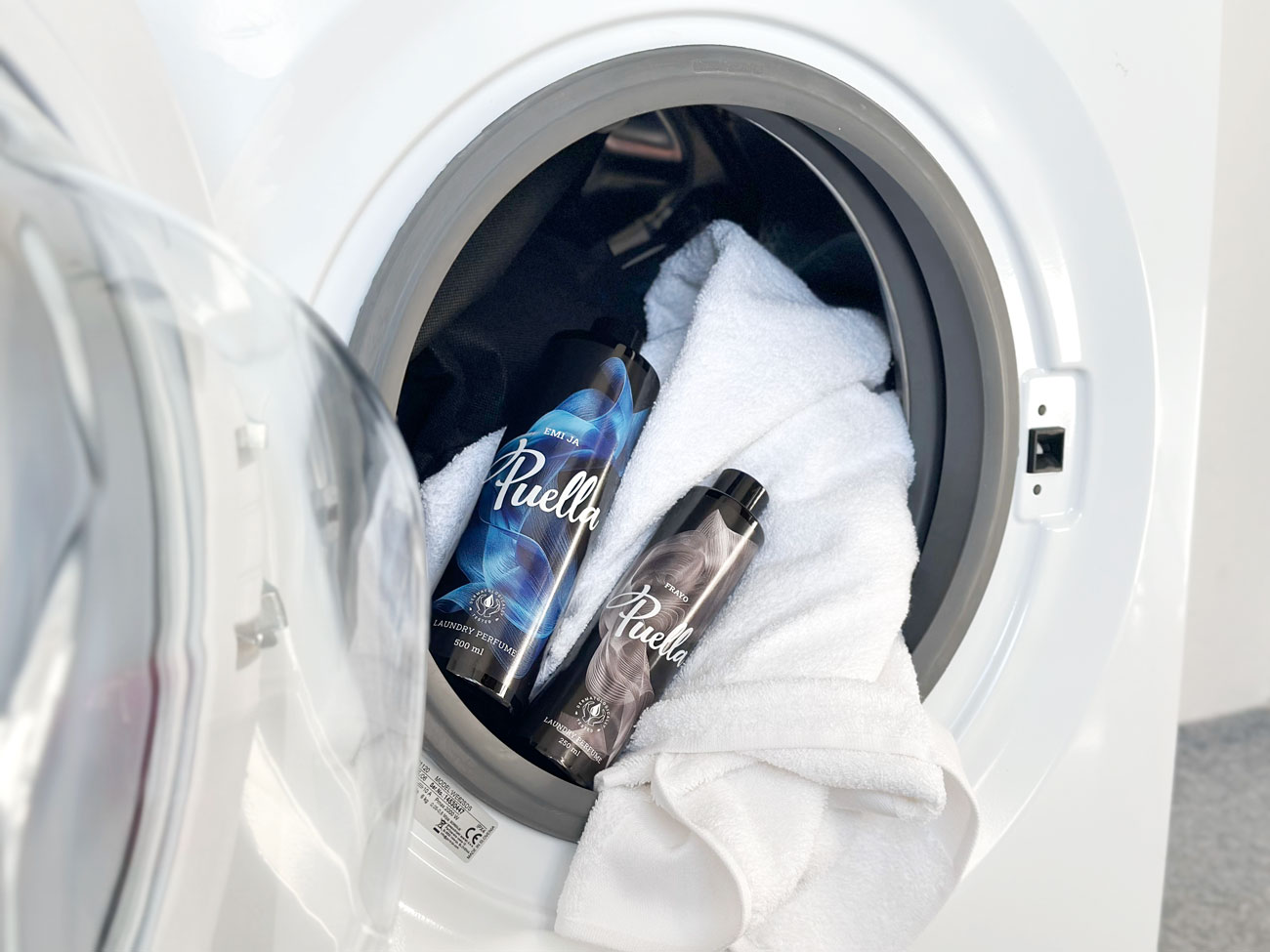 Towels and laundry perfumes in the washing machine