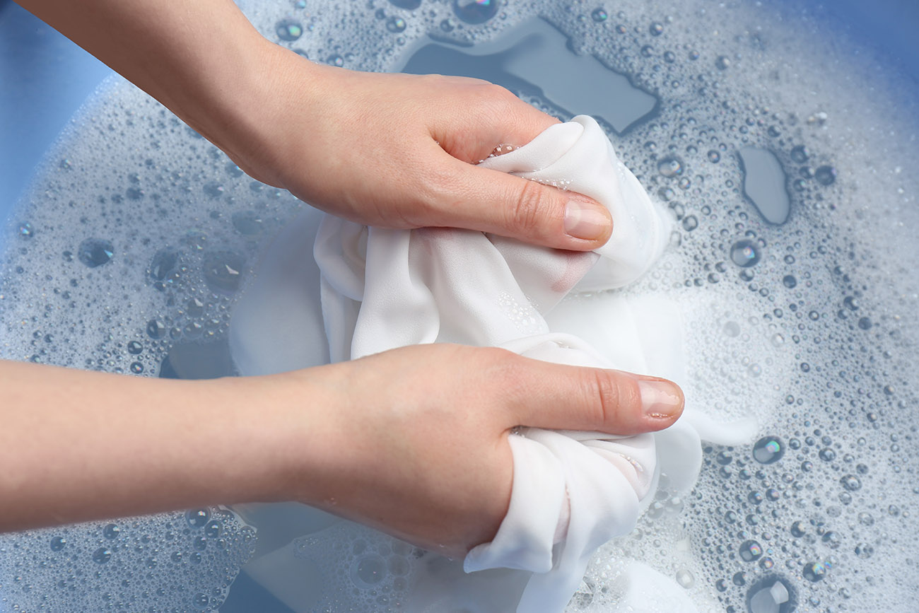 Washing stains on clothing