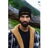 beanie mockup featuring a serious bearded man posing in the mountains m35641