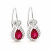 3134 stribrne nausnice teardrop s tmave ruzovym kamenem
