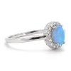 Stříbrný prsten s modrým opálem a zirkony (Velikost Vel.9 - EU: 60)
