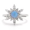 Stříbrný prsten vločka s modrým opálem a zirkony (Velikost Vel.10 - EU: 64)