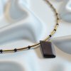 Pozlacený náhrdelník s černým turmalínem